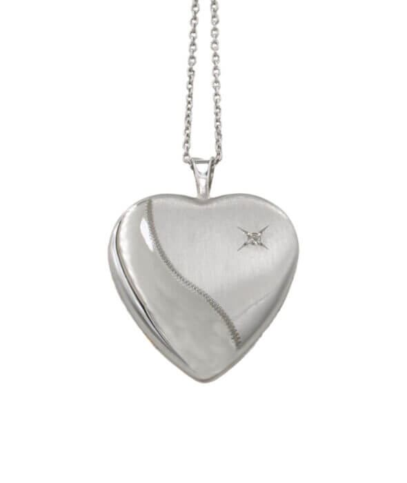 14 Karat Yellow and White Gold Heart Shaped Locket with Diamond Accent