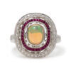 18 Karat White Gold Opal, Ruby and Diamond Halo Ring front view
