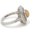 18 Karat White Gold Opal, Ruby and Diamond Halo Ring side view