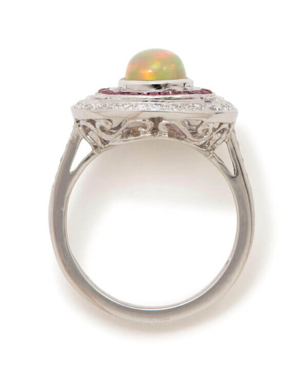 18 Karat White Gold Opal, Ruby and Diamond Halo Ring top view