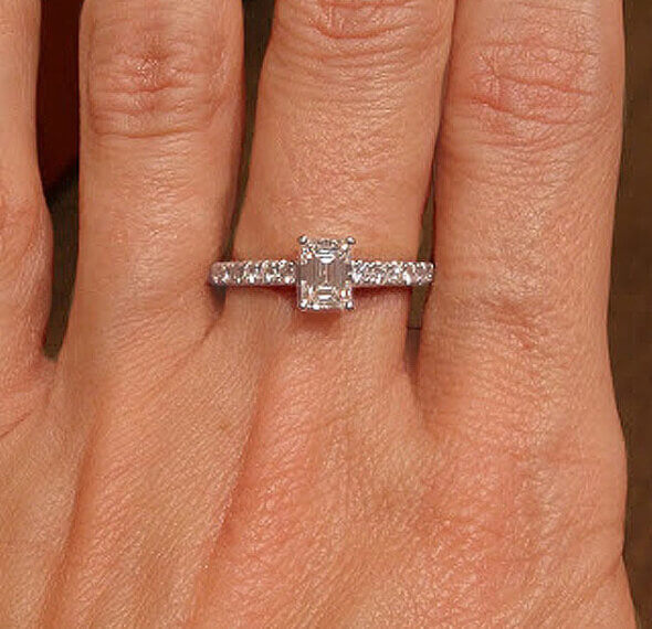 Platinum 0.54 Carat Emerald Cut Diamond Ring on hand