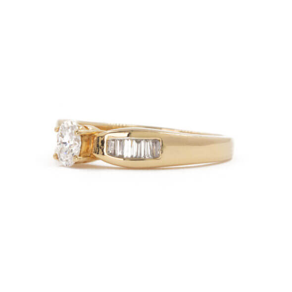 14 Karat Yellow Gold Oval and Baguette Diamond Ring side view