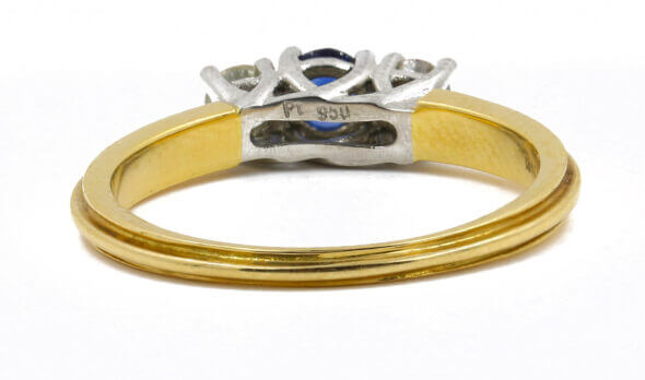 Platinum and 18 Karat Yellow Gold Sapphire and Diamond Three Stone Ring