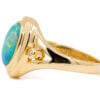 14 Karat yellow gold bezel set Opal Ring with diamond accents side view