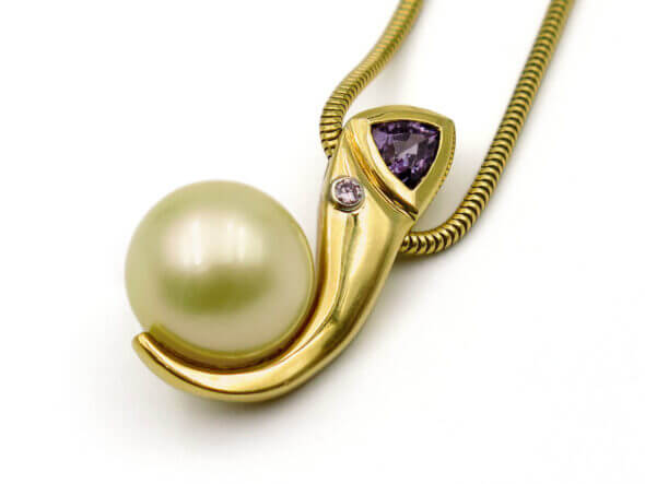 18 Karat Yellow Gold South Sea Pearl, Pink Diamond and Garnet Necklace side view