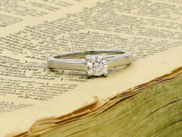 diamond ring on a book