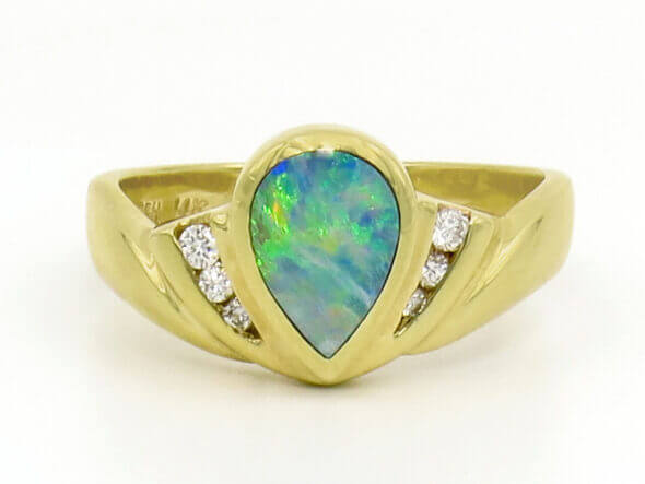 14 Karat Yellow Gold Pear Shaped Opal and Diamond Ring front view