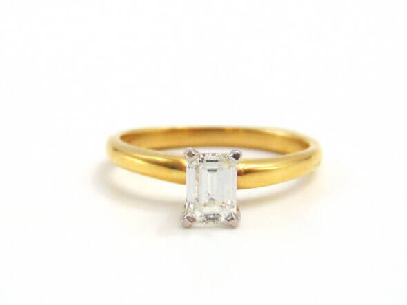18 Karat Yellow Gold and Platinum Emerald Cut Diamond Solitaire Ring front view