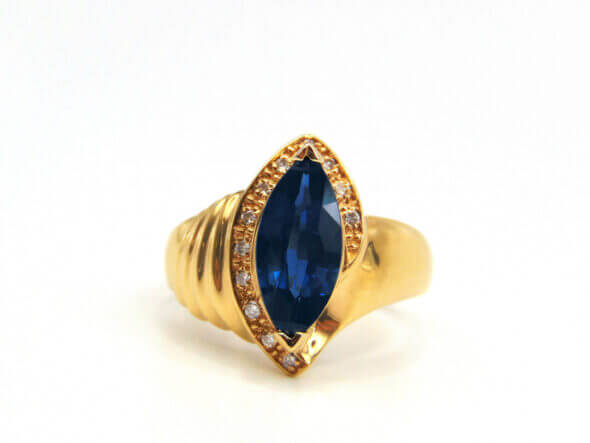 14 Karat Yellow Gold Marquise Cut Sapphire and Diamond Ring front view