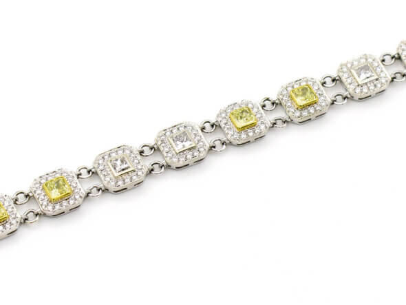 18 Karat White and Yellow Gold with White and Yellow Diamond Bracelet