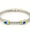 Silver and 18 Karat Yellow Gold Weave Bracelet with Bezel Set Topaz front view