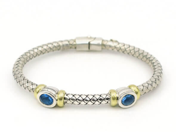 Silver and 18 Karat Yellow Gold Weave Bracelet with Bezel Set Topaz front view