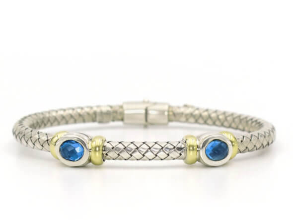 Silver and 18 Karat Yellow Gold Weave Bracelet with Bezel Set Topaz front view