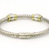 Silver and 18 Karat Yellow Gold Weave Bracelet with Bezel Set Topaz back view