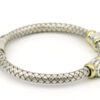 Silver and 18 Karat Yellow Gold Weave Bracelet with Bezel Set Topaz side view