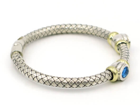 Silver and 18 Karat Yellow Gold Weave Bracelet with Bezel Set Topaz side view