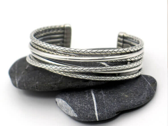 Sterling Silver Six Row Cuff Bracelet on rocks