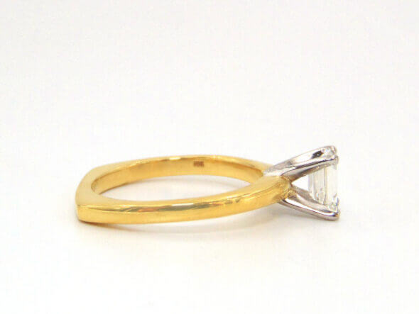 18 Karat Yellow Gold and Platinum Emerald Cut Diamond Solitaire Ring side view