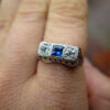 18 Karat White Gold Art Deco Diamond and Sapphire Three Stone Ring on hand