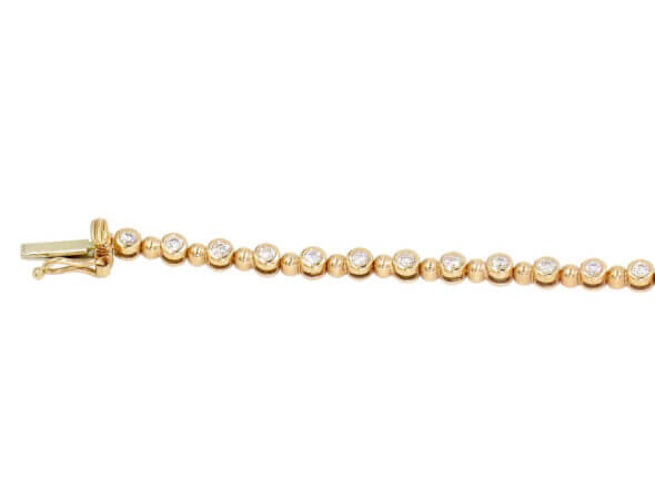 14 Karat Rose Gold Bezel Set Diamond Bracelet laying down