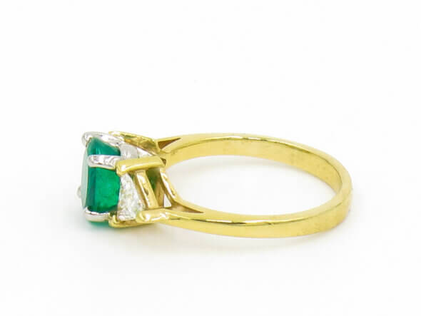 14 Karat Yellow and White Gold Emerald and Trillion Cut Diamond Ring side view