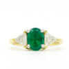 14 Karat Yellow and White Gold Emerald and Trillion Cut Diamond Ring front view