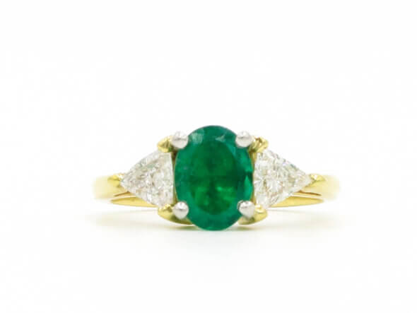 14 Karat Yellow and White Gold Emerald and Trillion Cut Diamond Ring front view