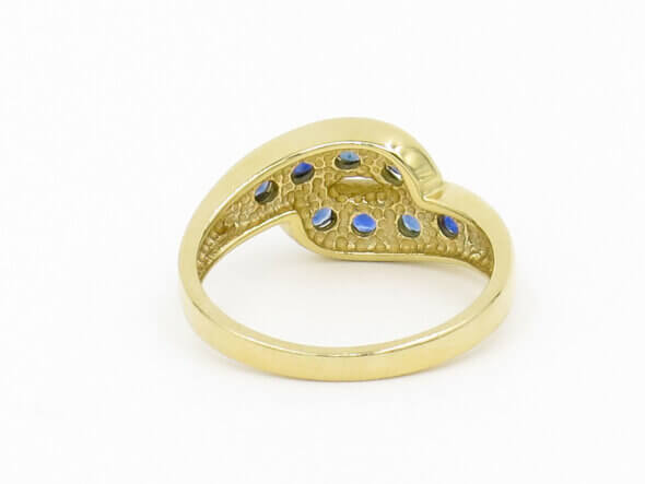 14 Karat Yellow Gold and Sapphire Twist Band