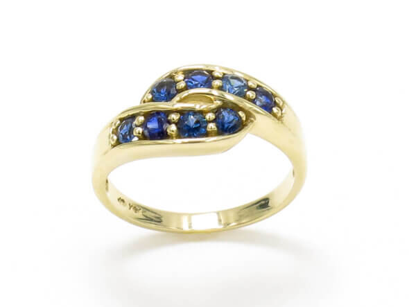 14 Karat Yellow Gold and Sapphire Twist Band