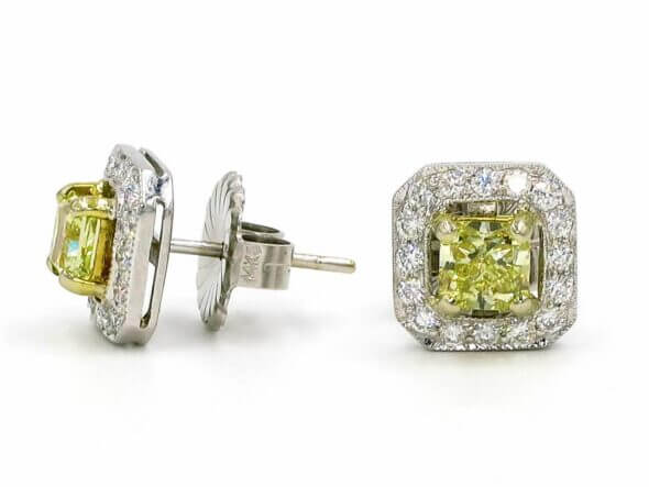 18 Karat White and Yellow Gold Fancy Yellow Diamond Earrings with Diamond Halo front and side