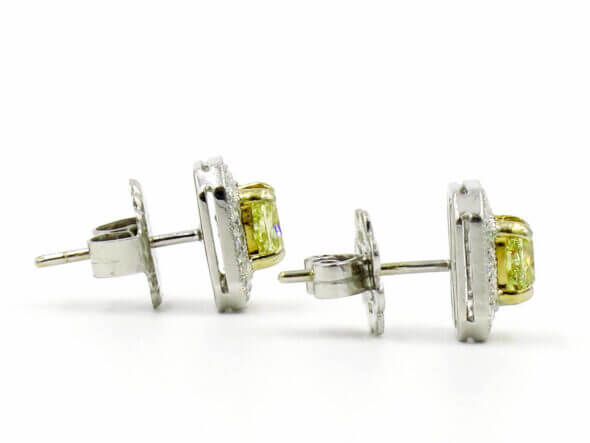 18 Karat White and Yellow Gold Fancy Yellow Diamond Earrings with Diamond Halo right side