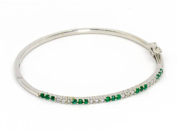 18 Karat White Gold Emerald and Diamond Bangle Bracelet side view