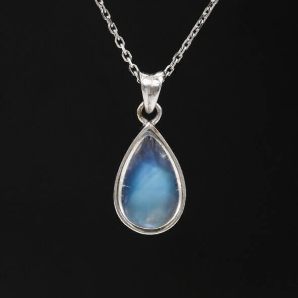 Moonstone Pendant Bezel Set in 18 Karat White Gold on black background