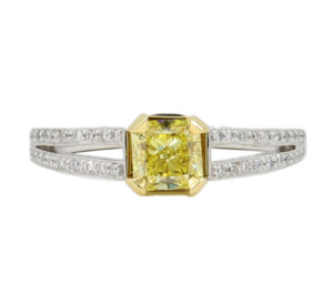 Platinum and 18 Karat Yellow Gold Fancy Intense Yellow Radiant Cut Diamond Ring with GIA Report front view