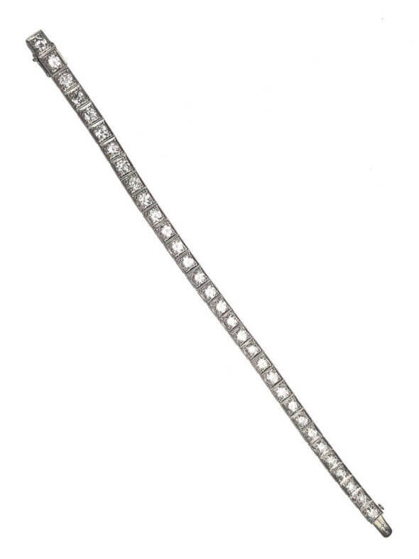 Platinum Art Deco Diamond Line Bracelet Signed "Barthman" lying flat