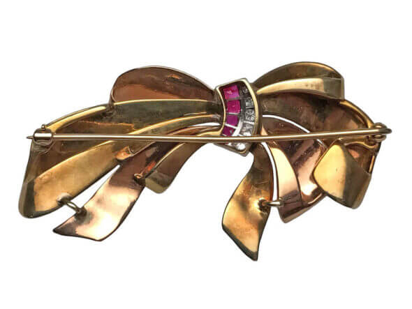 14 Karat Yellow and Rose Gold Diamond and Ruby Bow Brooch front