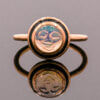 18 Karat Rose Gold Carved Opal Face Ring With Black Enamel front view