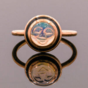 18 Karat Rose Gold Carved Opal Face Ring With Black Enamel front view