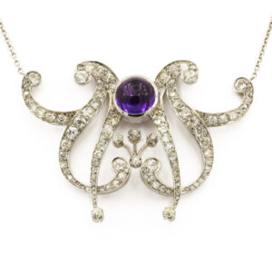 Platinum Cabochon Cut Amethyst and Diamond Pendant on 16 Inch Chain front view