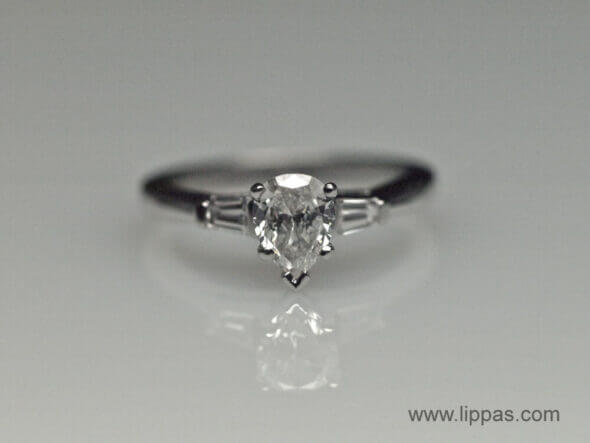 Platinum Pear Shape Diamond With Tapered Baguette Diamond Accents