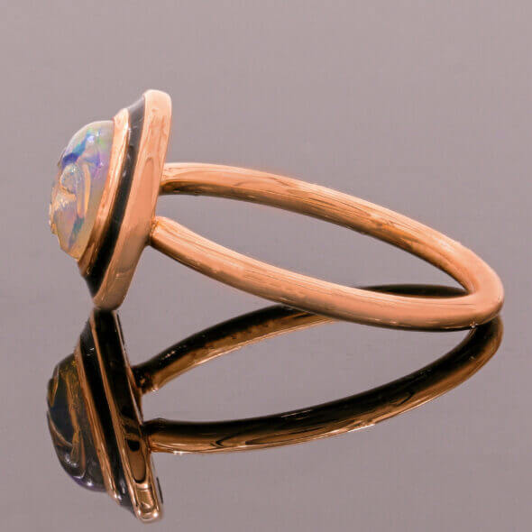 18 Karat Rose Gold Carved Opal Face Ring With Black Enamel side view