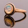 18 Karat Rose Gold Carved Opal Face Ring With Black Enamel side view