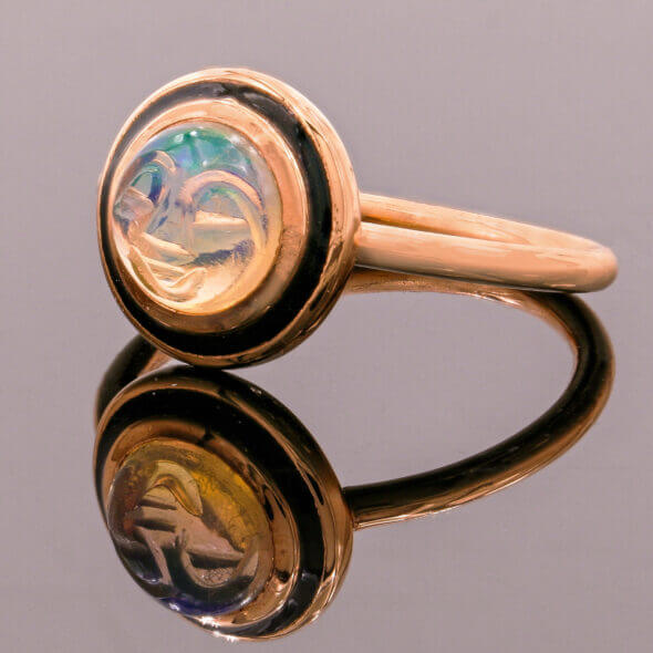 18 Karat Rose Gold Carved Opal Face Ring With Black Enamel side view