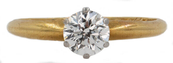 Tiffany & Co. Solitaire Diamond Ring in 18 Karat Yellow Gold and Platinum