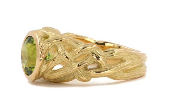 2.21 Carat Peridot 18 Karat Yellow Gold Woven Style Shank Ring