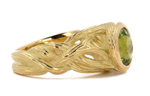 2.21 Carat Peridot 18 Karat Yellow Gold Woven Style Shank Ring