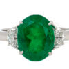 Platinum 4.07 carat oval Colombian Emerald with Half Moon Shaped diamonds