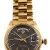 Rolex 18 karat yellow gold date date. brown dial