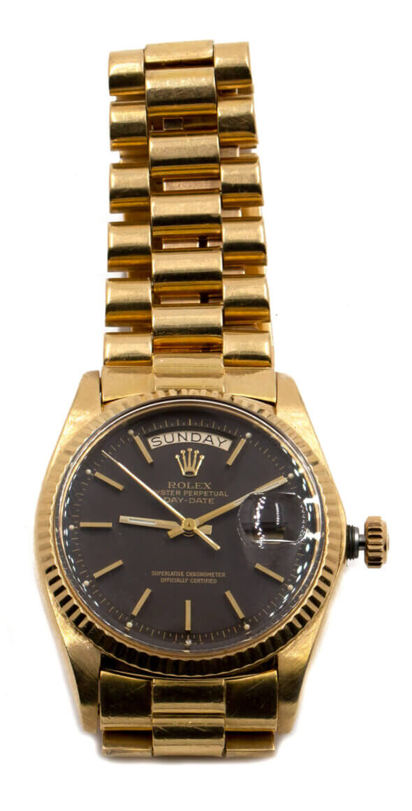 Rolex 18 karat yellow gold date date. brown dial
