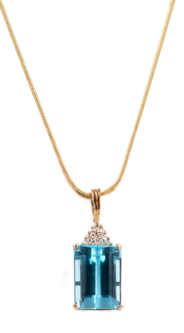 Aqua Marine Pendant Front Topaz and Diamond Necklace in 14 karat Yellow Gold
